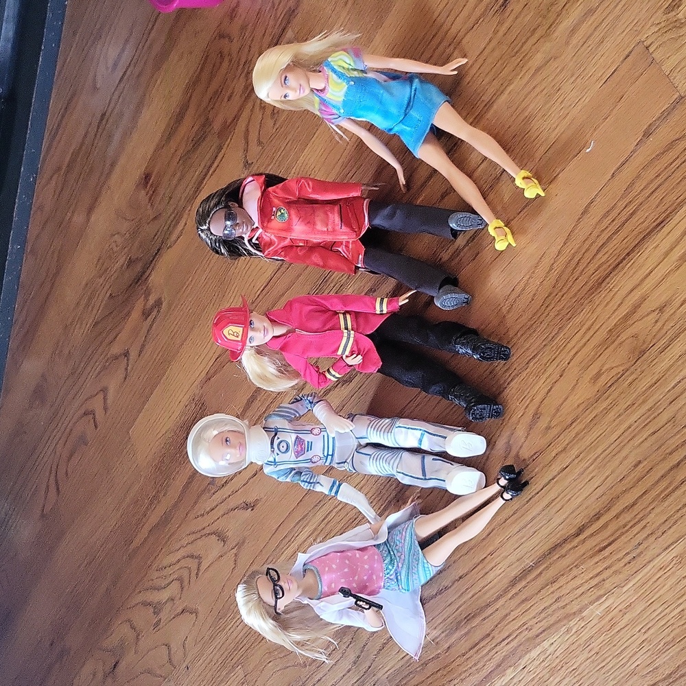 Career Barbies, Optometrist,  Fireman, Astronaut, Marine Biologist, Painter.